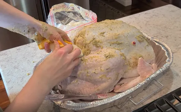 put-citrus-and-onion-in-turkey-cavity