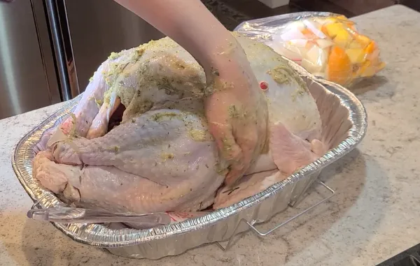 rub-extra-herb-butter-on-turkey-skin